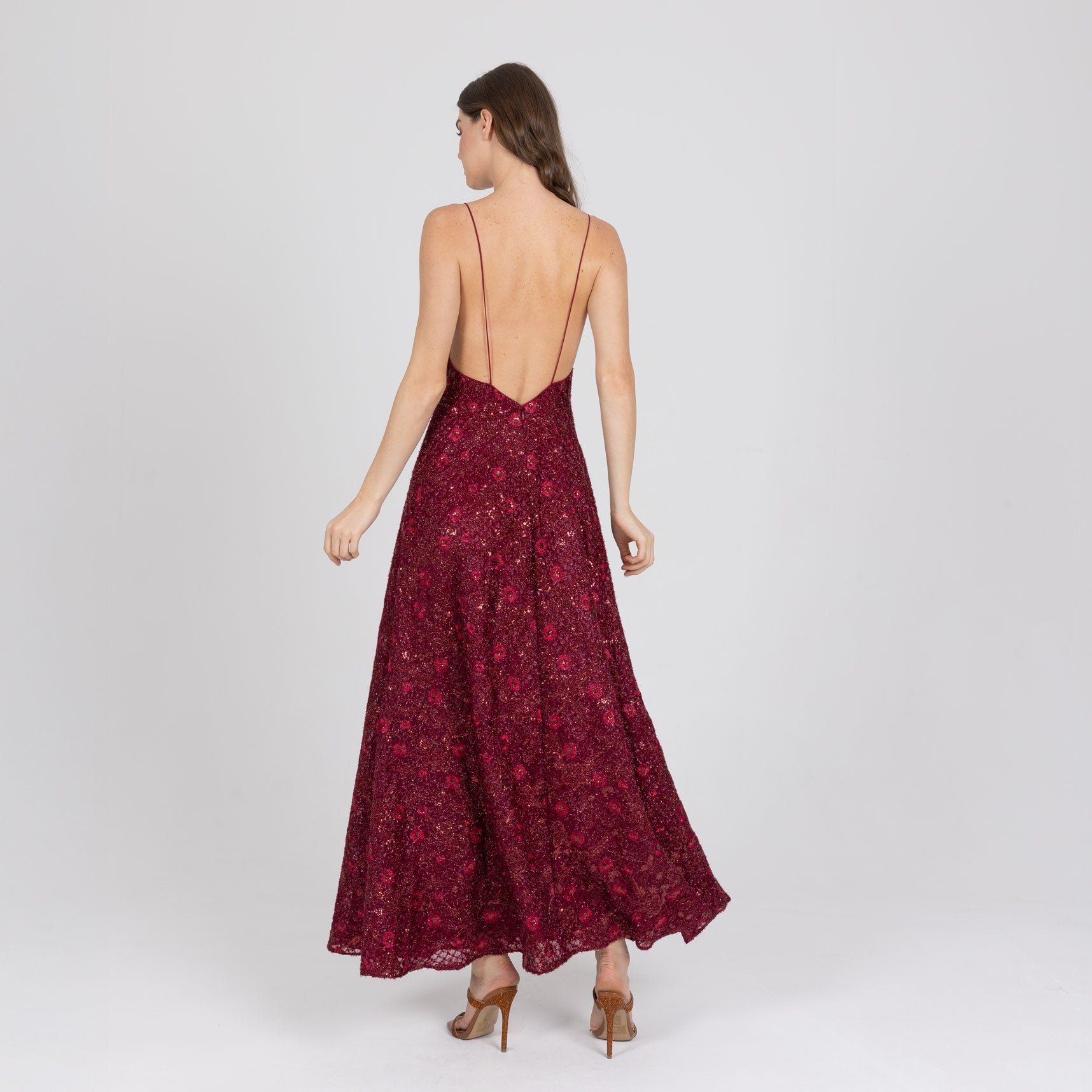 Red embroidered slip dress in motion – elegant silhouette and fluid fit