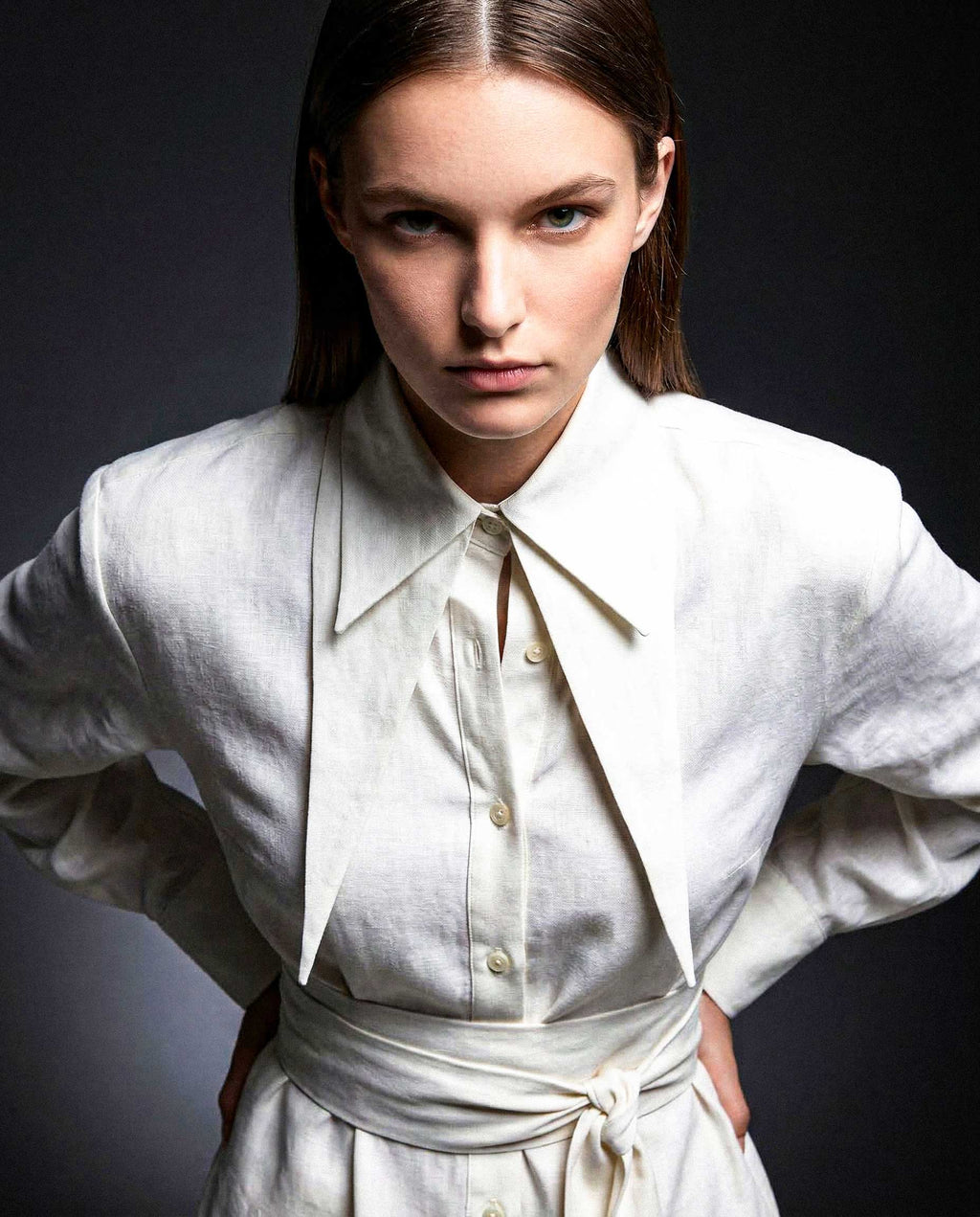 Tie waist detail on white linen shirt