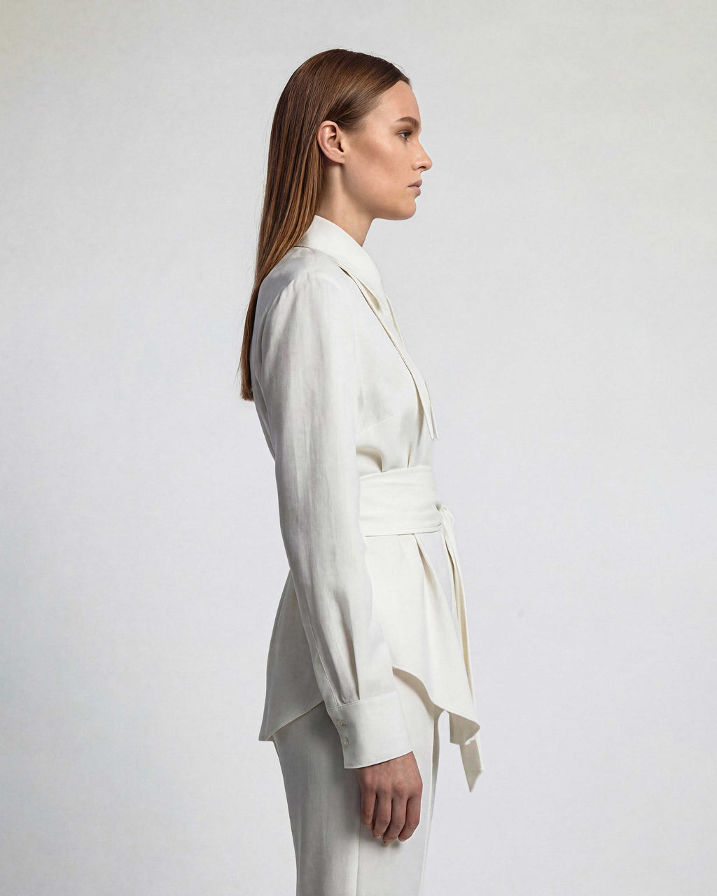 White linen shirt with fluid drape and elongated collar