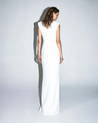 Back view of ISARA white floor-length gown with clean minimalist design