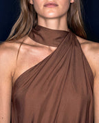 Detail of ALMERA cupro mini dress with asymmetric draped neckline