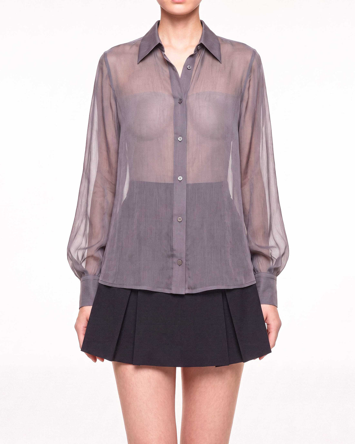 Front detail of the ÉLYR sheer charcoal silk chiffon shirt with button closure, pointed collar and voluminous sleeves by A|LOUD