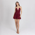 Model wearing red embroidered mini cocktail dress with deep V neckline – Lioren Dress by A|LOUD