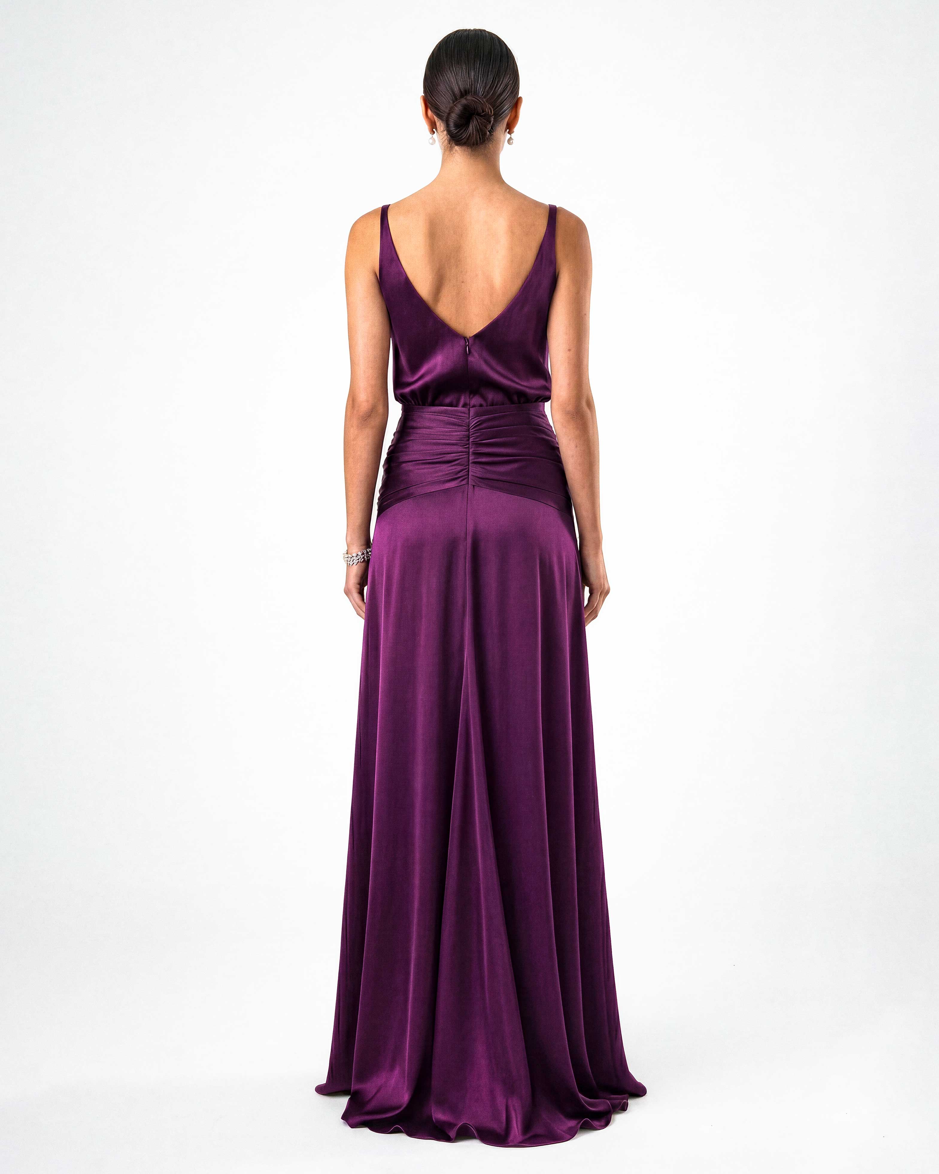 Back view of satin evening dress with open back design