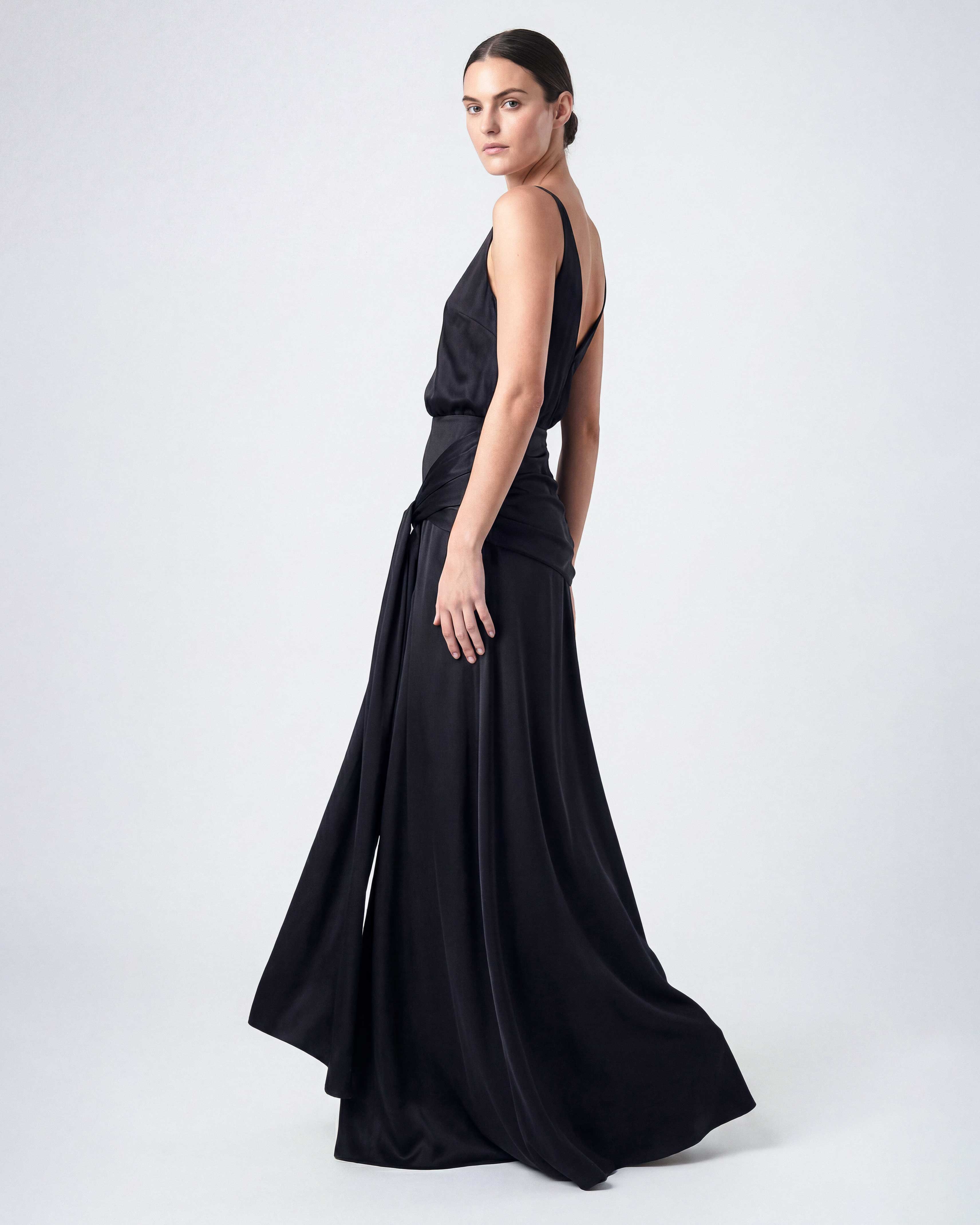 Side view of black satin evening dress