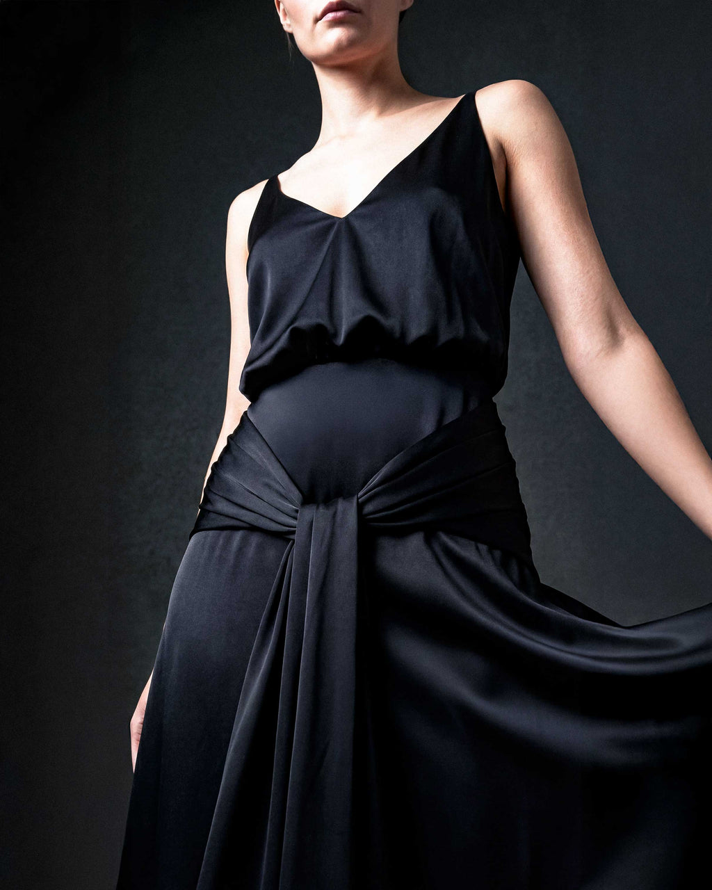 black satin evening gown with fluid silhouette