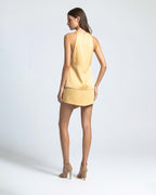 Back view of butter yellow satin halter top