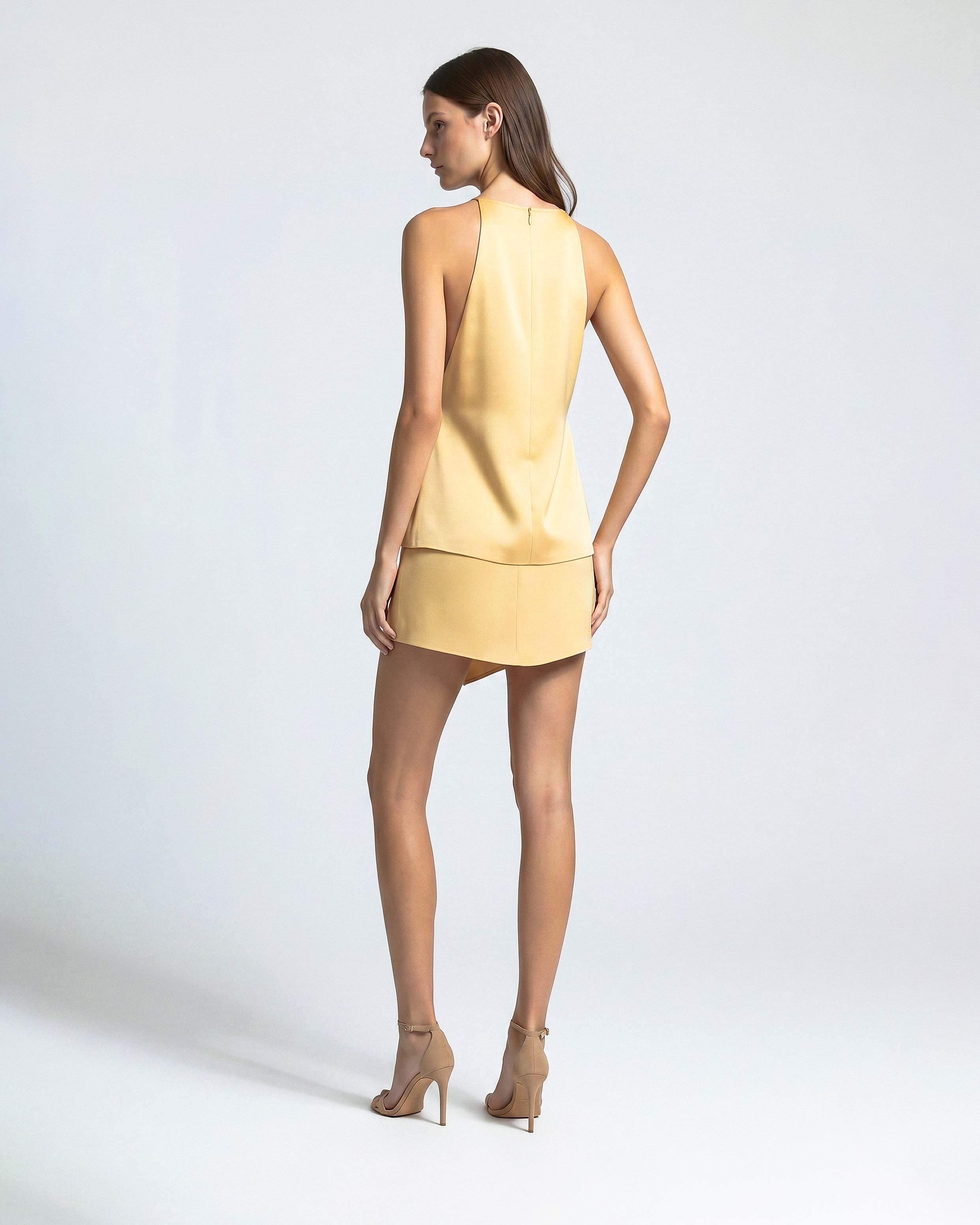 Back view of butter yellow satin halter top