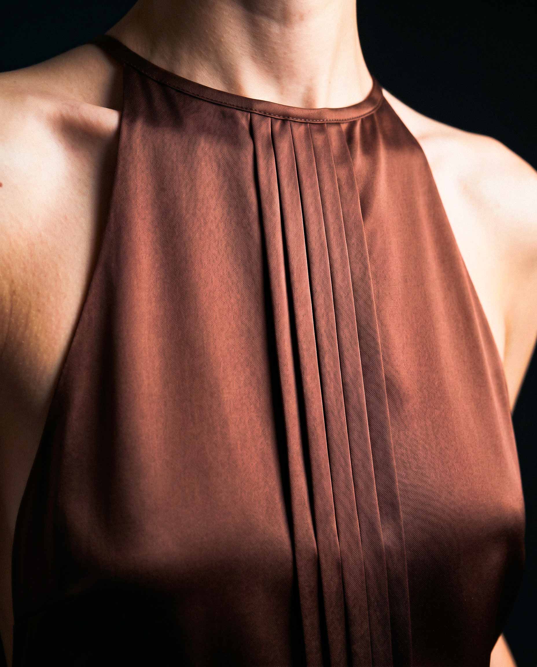 High neckline detail on brown silk satin halter top