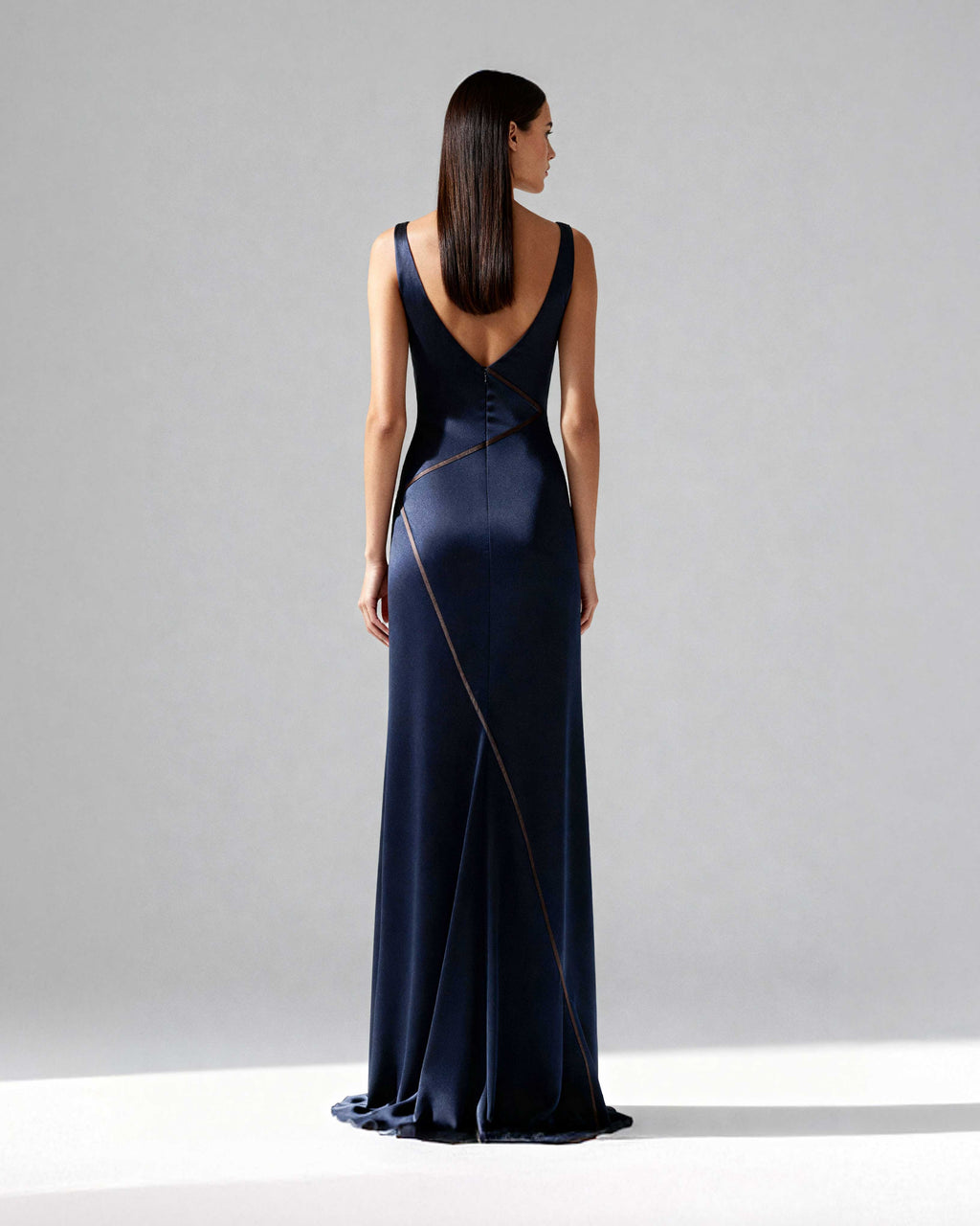 back view highlighting the deep V neckline and copper seam