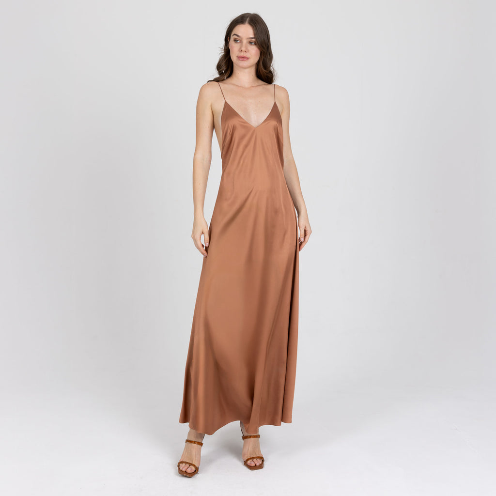 Elegant bias-cut satin gown in copper tone with soft flare and delicate straps