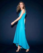 Side view of ARLENA stretch crepe maxi dress with asymmetric skirt and fluid silhouette