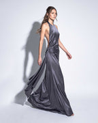 Side view of MIREILLE silk satin evening gown with open sides and flowing draped panel