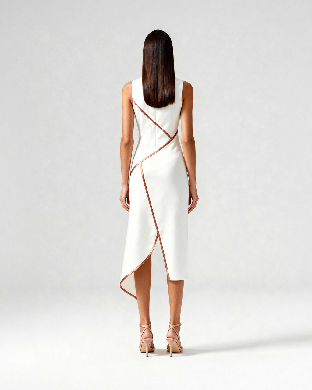 Back view of white midi dress with diagonal satin piping and asymmetric hem, highlighting the tailored back.