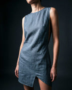 Asymmetrical linen mini dress in blue with structured silhouette