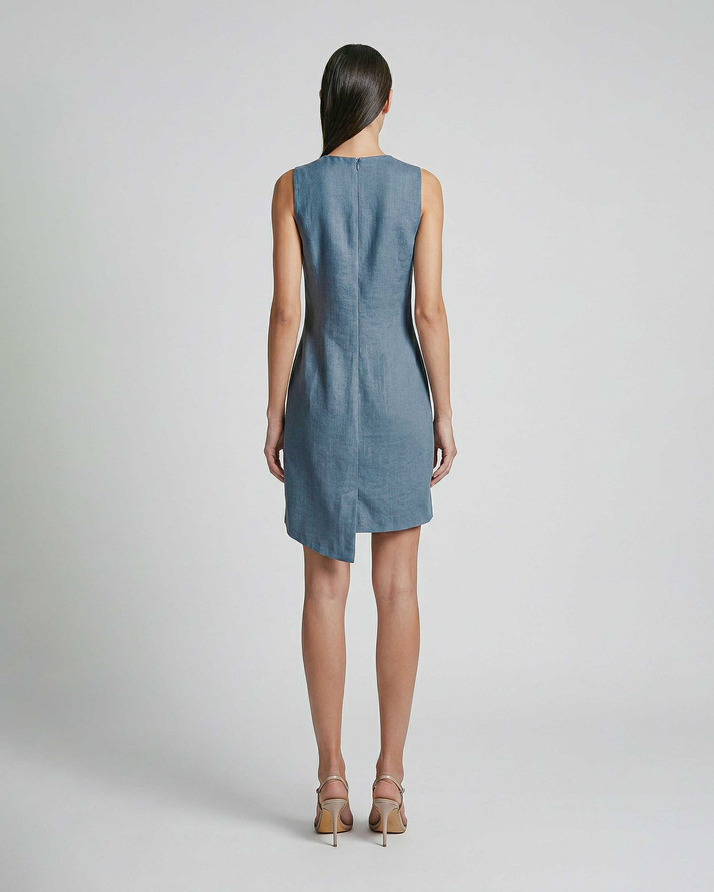 Back view of sleeveless blue linen mini dress