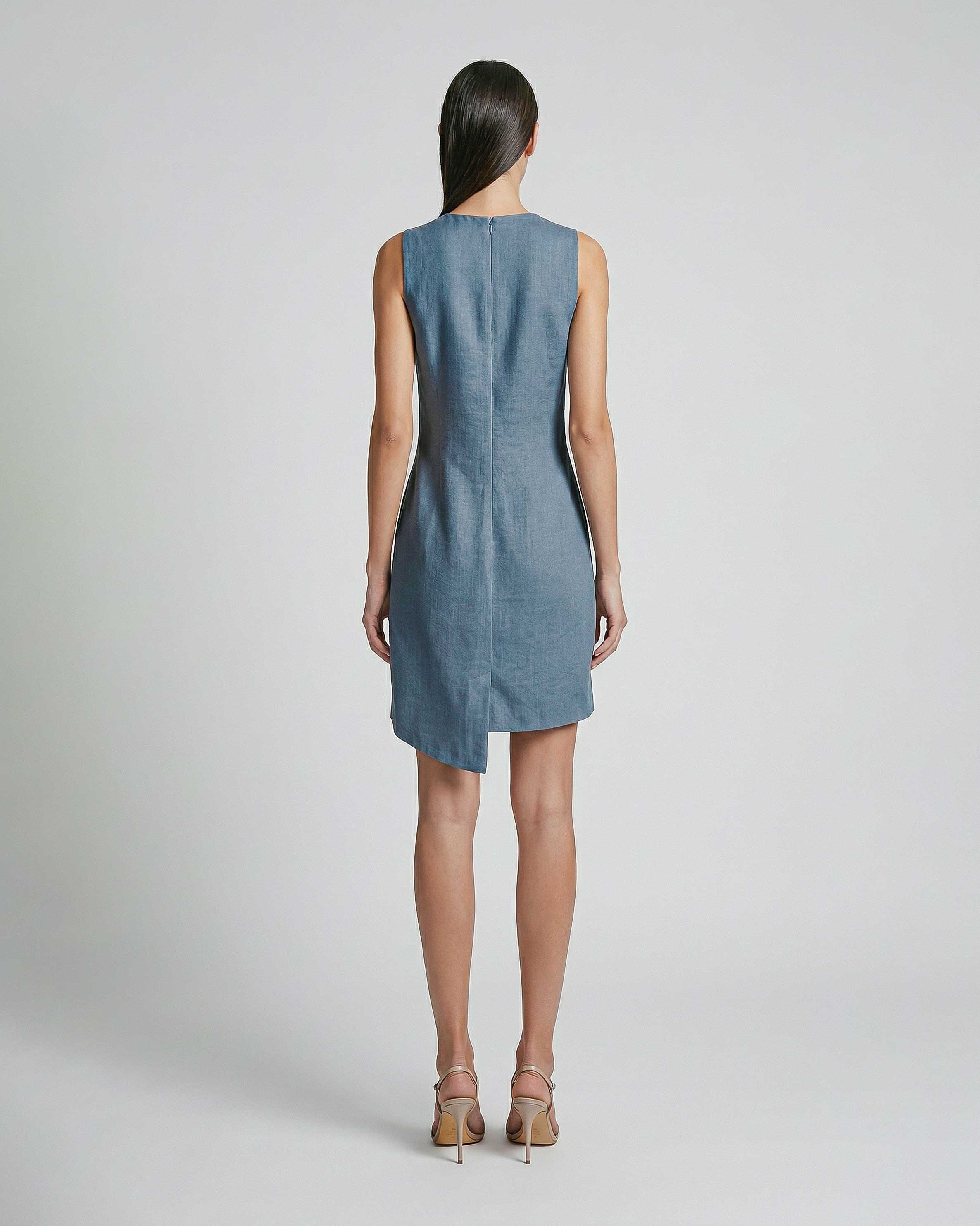 Back view of sleeveless blue linen mini dress