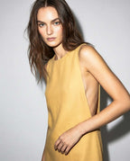 Structured linen mini dress in yellow with clean silhouette