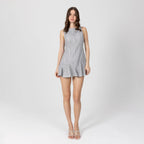 Model wearing grey lace mini dress – Zayra structured mini dress with architectural flounce