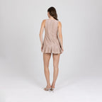 Zayra Mini Dress in motion – structured nude mini dress with refined details