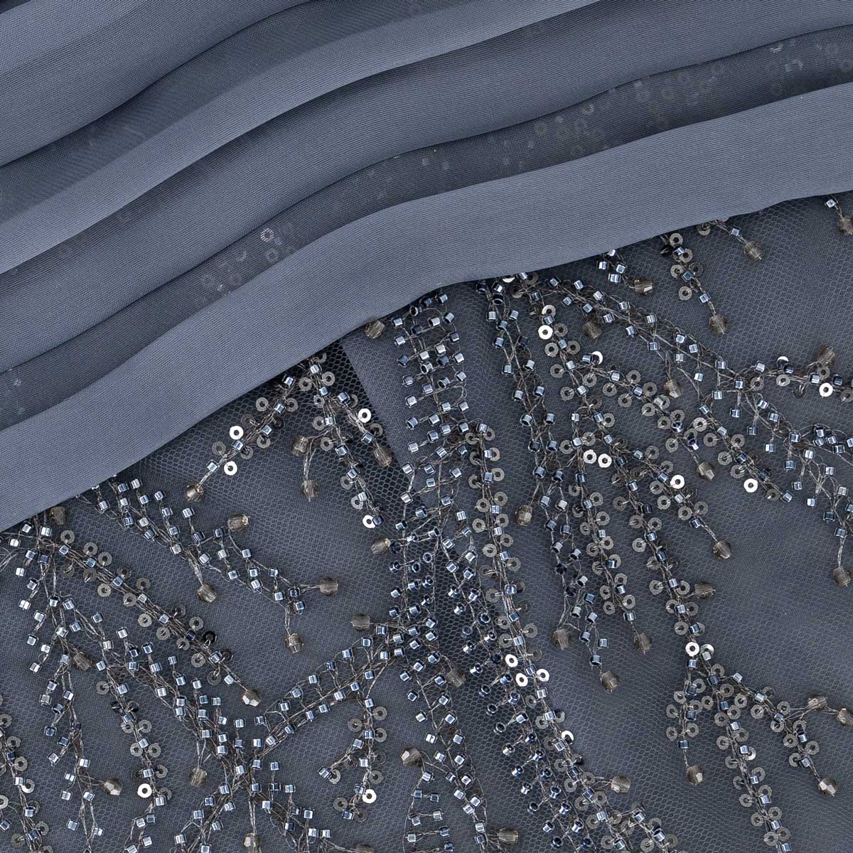 Close-up of blue beaded embroidery on Muse Gown fabric
