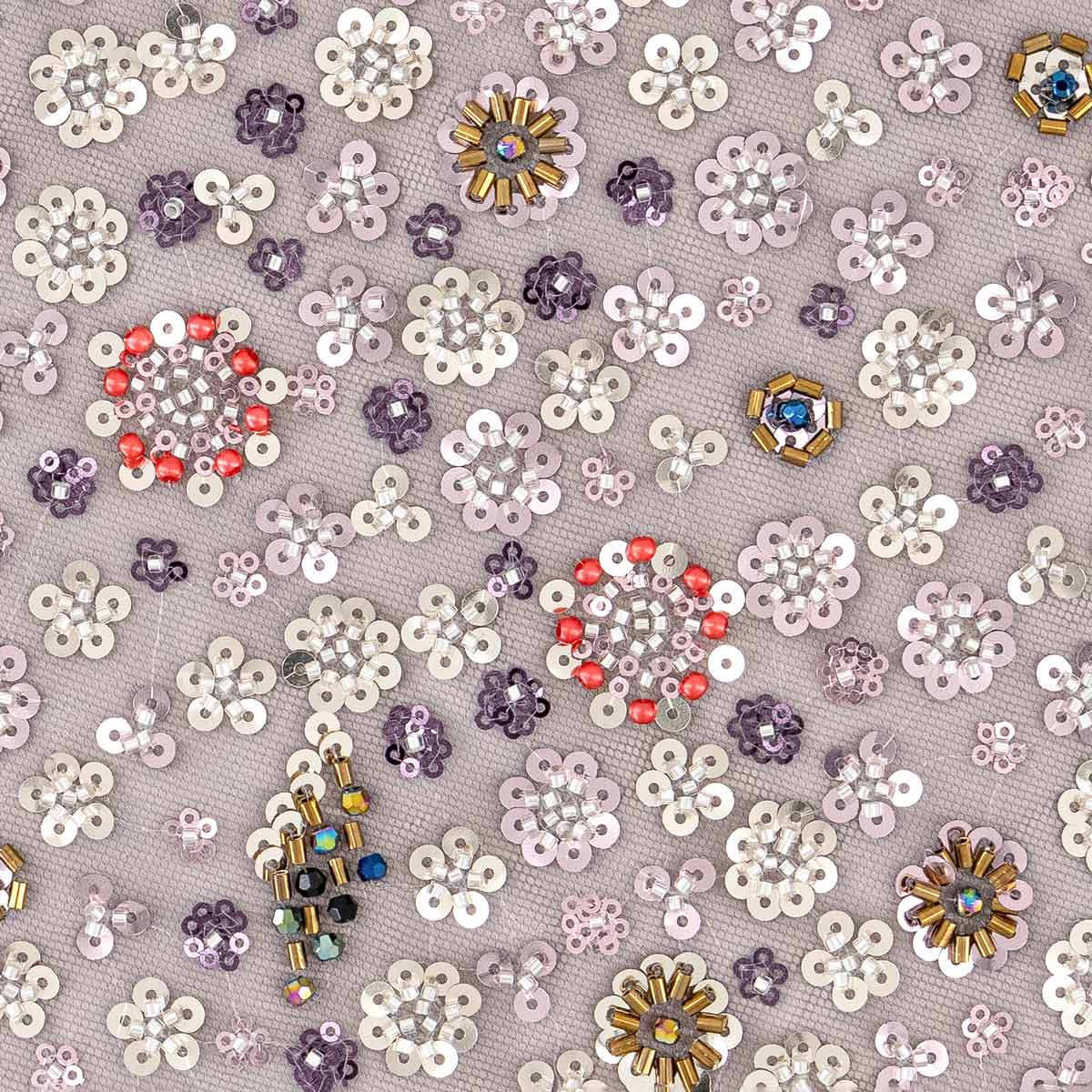 Close-up of Ayla fabric – floral embroidery with sequin and bead embellishments