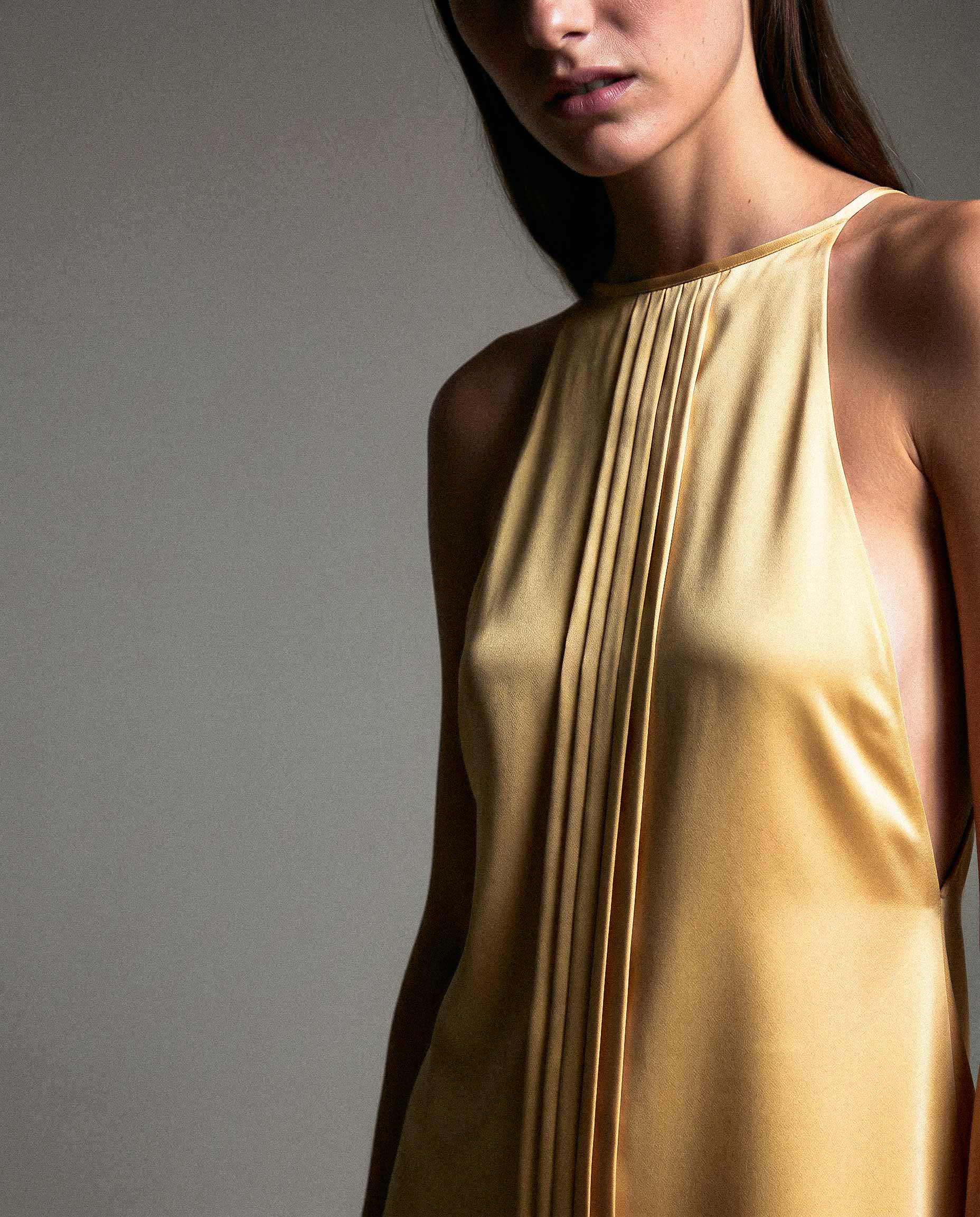 Pleated front detail on butter yellow silk satin top