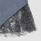 Close-up of embroidered tulle – luxury lace detail used in Thalia Mini Dress